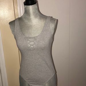 H&M gray lace up bodysuit in size M